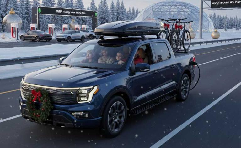 Electric vehicle charging during a winter holiday road trip in Christmas 2025
