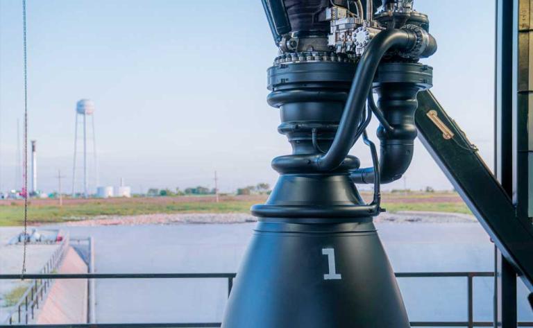 SpaceX Raptor 3 rocket engine showing minimalist design, exposed structure, and advanced engineering for Starship