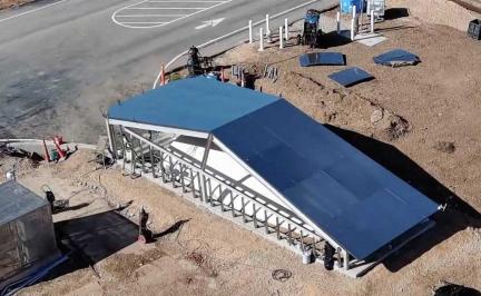 Tesla Cybertunnel at Giga Texas with Cybertruck emerging from the birthing tunnel