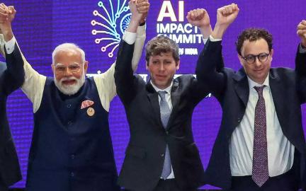 Sam Altman and Dario Amodei standing beside PM Narendra Modi during a tense moment at India AI Impact Summit 2026