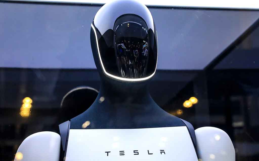 Tesla Optimus Gen 3 humanoid robot performing factory tasks with advanced hand dexterity and AI-powered vision system in 2026.