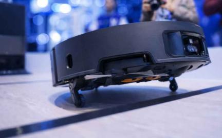 Advanced robot vacuum climbing stairs using AI-powered legs and smart navigation in a multi-story home