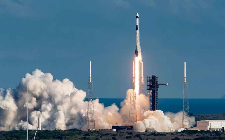 SpaceX Falcon 9 rocket launching Starlink satellites into orbit from Cape Canaveral Florida