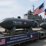 Autonomous Triton underwater and surface drone conducting maritime surveillance in the South China Sea near the Philippines.